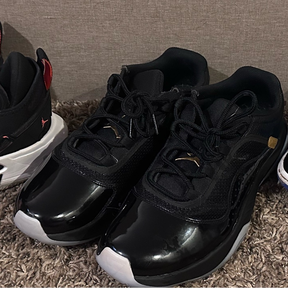 Jordan Black and Gold Sneakers